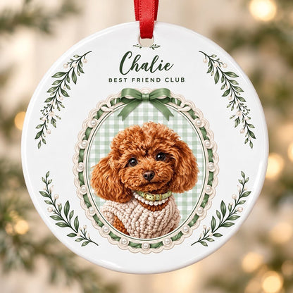 Round ceramic ornament with a poodle portrait, 'BEST FRIEND CLUB', green gingham, bow, and leafy sprigs.