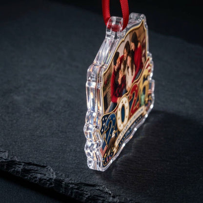 Custom-cut acrylic ornament with '2026', eagle, Statue of Liberty, flags and a gold photo frame.