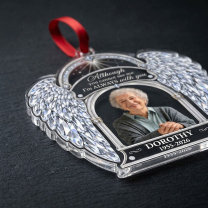 Acrylic memorial ornament with crystal angel wings, arched photo frame and wood-grain name and date banners.