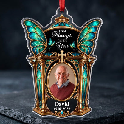 Clear acrylic ornament with winged shrine, teal butterfly wings, cross, oval photo, and 'I AM Always WITH You'.