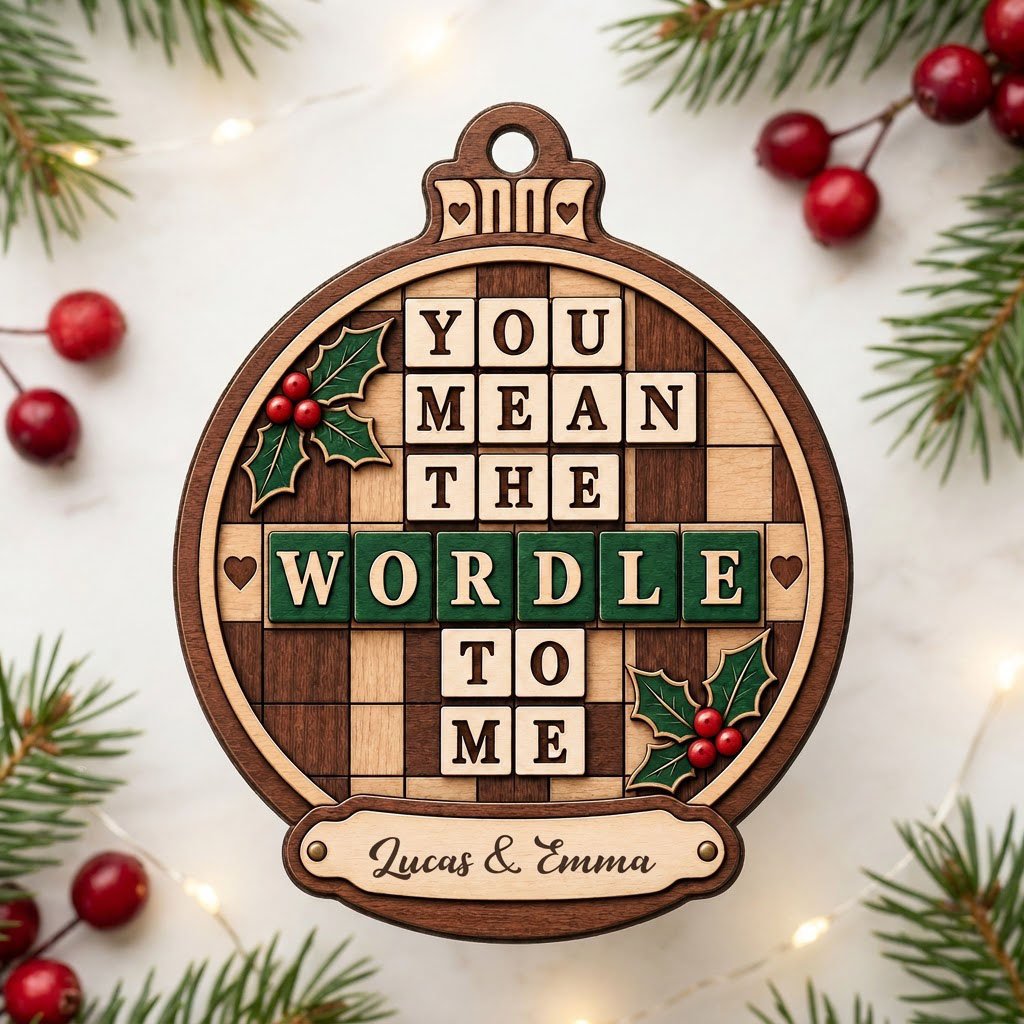 Bauble wood ornament with 'You Mean The Wordle To Me', green WORDLE tiles, holly and personalized names