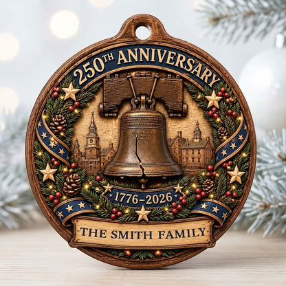 Round wood ornament with Liberty Bell, Independence Hall, pine wreath, gold stars, and a name banner.