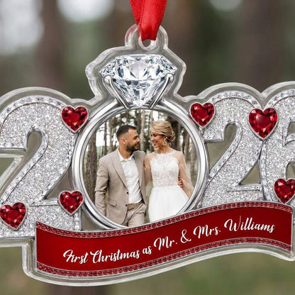 Acrylic ornament shaped like 2025 with a diamond-topped ring photo frame, red heart jewels and a red name banner