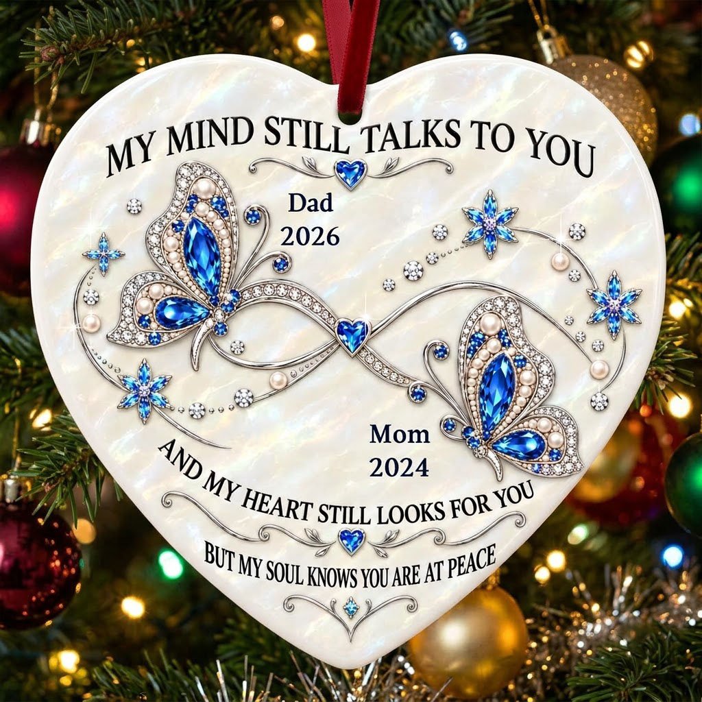 Heart ceramic ornament with blue jeweled butterflies, a silver infinity, and quote 'My Mind Still Talks To You'.