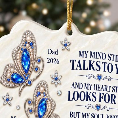 Scalloped ceramic ornament with two blue jeweled butterflies, silver starburst flowers and a memorial quote.