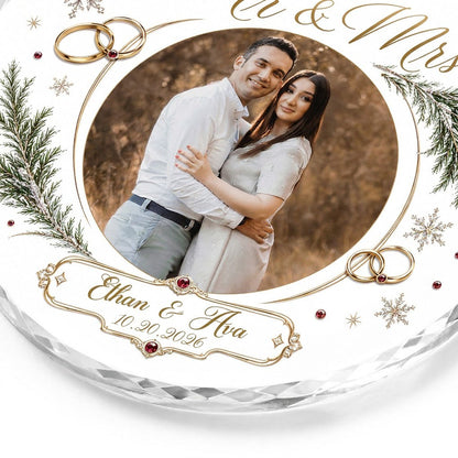 Round glass ornament with couple photo, gold wedding rings, snowflakes and 'OUR FIRST CHRISTMAS AS Mr & Mrs'.