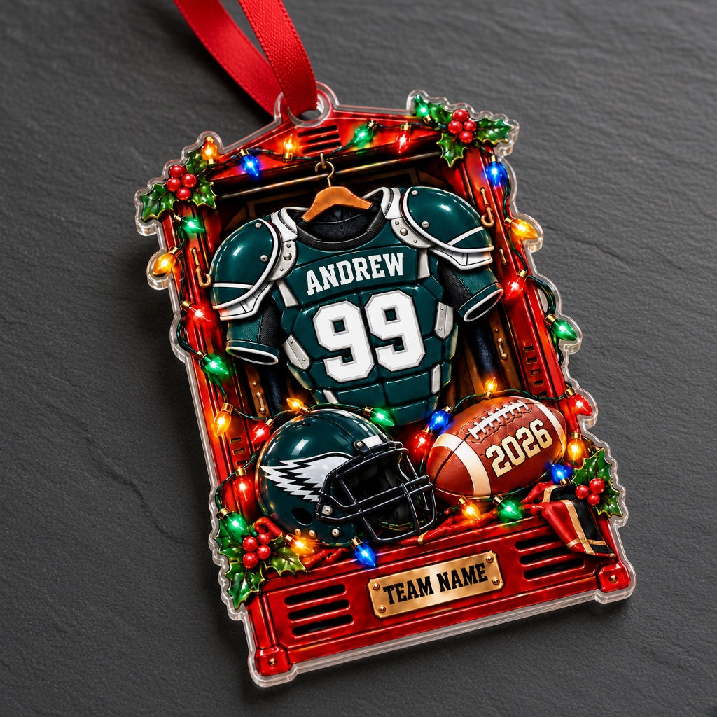 Acrylic ornament of a red football locker with a green jersey, helmet, football, lights and holly for Christmas