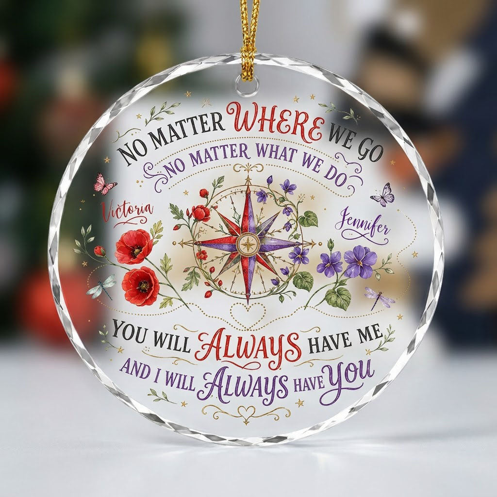 Round glass ornament with a compass rose, red and purple flowers, butterflies, dragonflies, and long-distance quotes.
