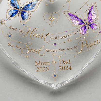 Heart-shaped glass ornament with blue and purple stained-glass butterflies, gold swirls, and memorial text.