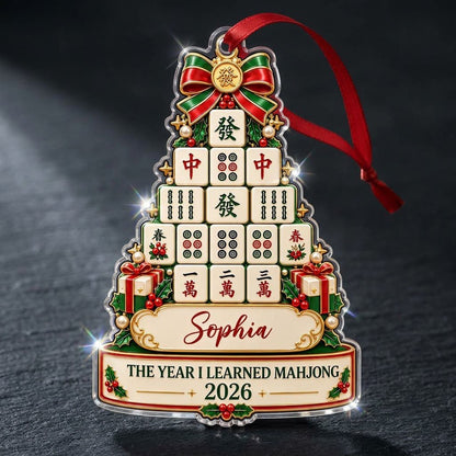 Acrylic tree ornament of mahjong tiles with bow, stars, holly, pearls, and two cream banners for name and year.