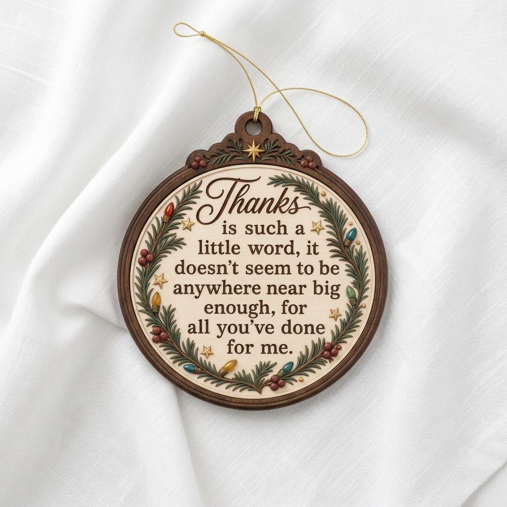 Wood ornament with arched top, pine branches, colorful lights, red berries, gold stars, and a heartfelt thank-you quote.