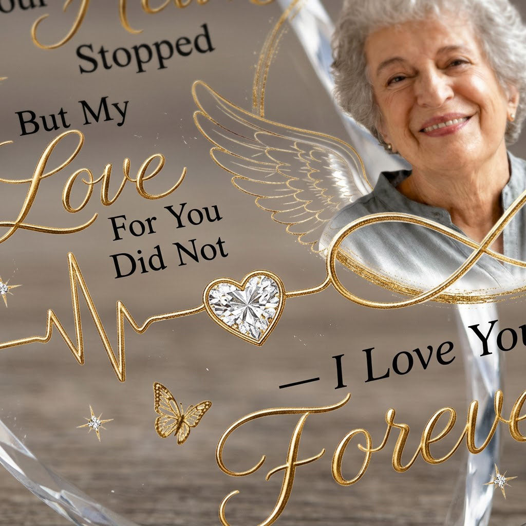Round ornament with angel wings, photo circle, infinity symbol, heartbeat line to heart, and butterflies.