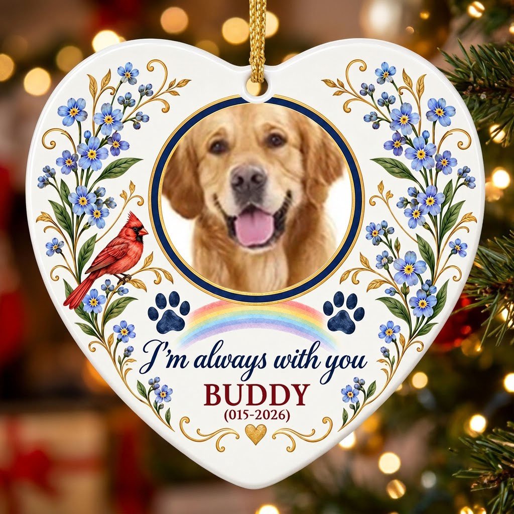 Heart ceramic ornament with a dog photo, red cardinal, blue forget-me-nots, rainbow, paw prints, and a gold heart accent