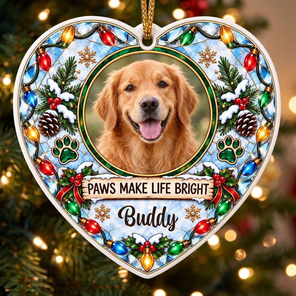 Heart ceramic ornament with dog photo frame, “PAWS MAKE LIFE BRIGHT”, lights, pine branches, paw prints, and red ribbon 