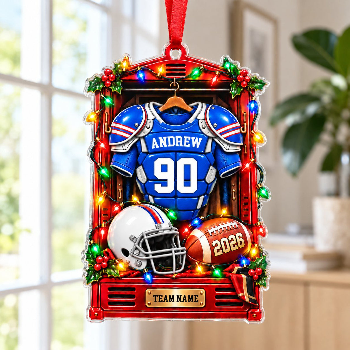 Acrylic ornament shaped like a red football locker with lights, jersey, helmet, football and gold nameplate.