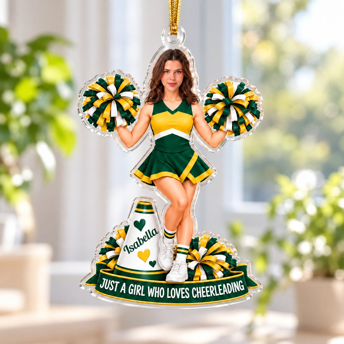 Custom-cut acrylic ornament with cheerleader, pom-poms, white megaphone with hearts, and green name banner.