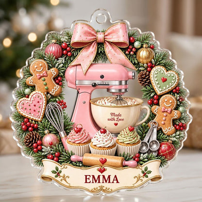 Scalloped clear acrylic ornament with a pink mixer in a Christmas baking wreath and a Made with Love banner.