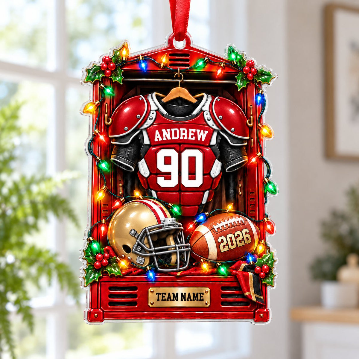 Acrylic ornament with a red football locker, jersey on hanger, gold helmet, brown football and gold plaque