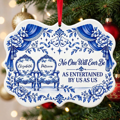 Blue-and-white ceramic ornament with theater masks, vintage chairs, Delft florals, and draped curtains.