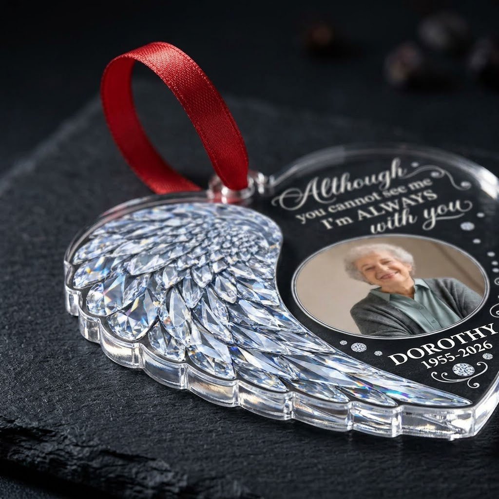 Heart-shaped clear acrylic ornament with crystal-style angel wing, round photo frame, and memorial quote