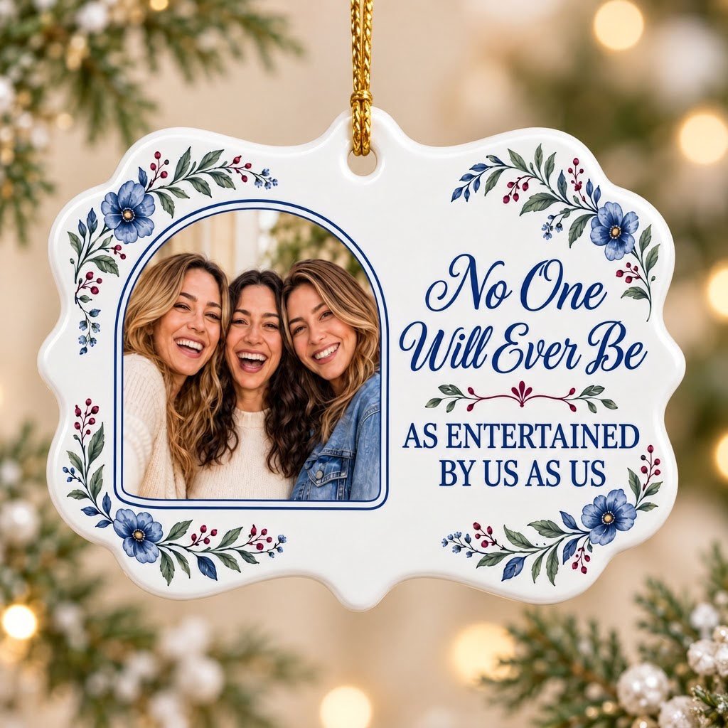 Blue floral ceramic ornament with navy photo frame and the text No One Will Ever Be As Entertained By Us As Us.