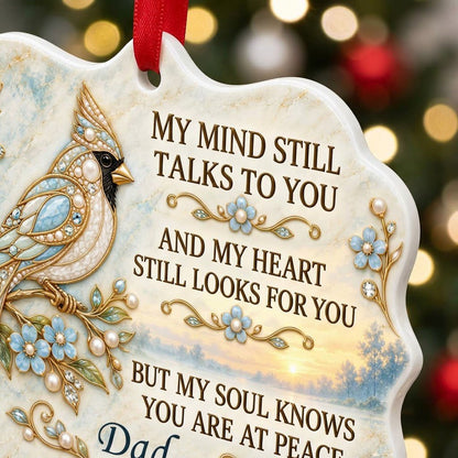 Ceramic medallion ornament with a jewel-encrusted blue bird, blue flowers, gold filigree, and a sunrise lake background.