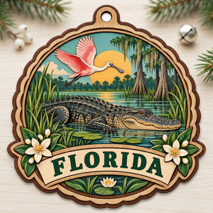 Scalloped wood ornament with alligator, pink spoonbill, sun, cypress trees, and 'FLORIDA' on a bottom banner.