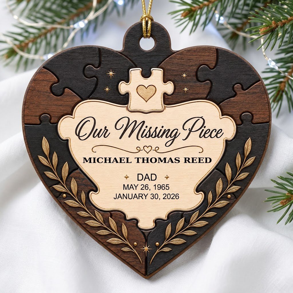 Heart wood ornament with puzzle-piece frame, Our Missing Piece title, laurel accents, personalized with name and dates.
