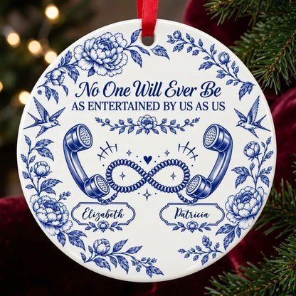 Blue toile round ornament with crown, swallows, vintage phones in an infinity and two name banners