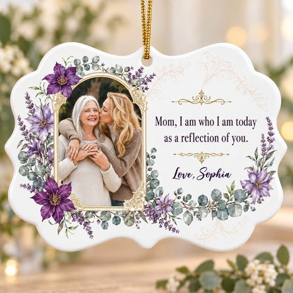 Gold frame photo with purple clematis and the quote 'Mom, I am who I am today as a reflection of you.'