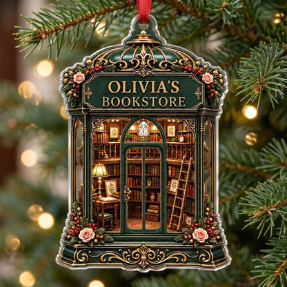 Green and gold ornate acrylic ornament with roses and a cozy bookstore interior reading OLIVIA'S BOOKSTORE.