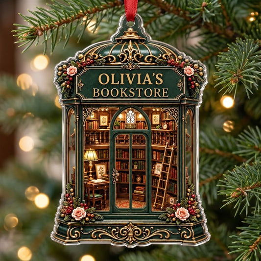 Green and gold ornate acrylic ornament with roses and a cozy bookstore interior reading OLIVIA'S BOOKSTORE.
