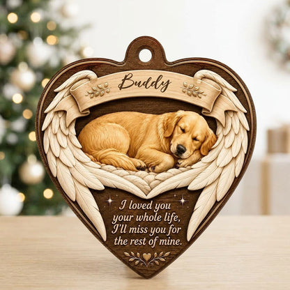 Heart-shaped wood ornament with a sleeping golden retriever, angel wings, ribbon banner, stars, and a memorial quote.