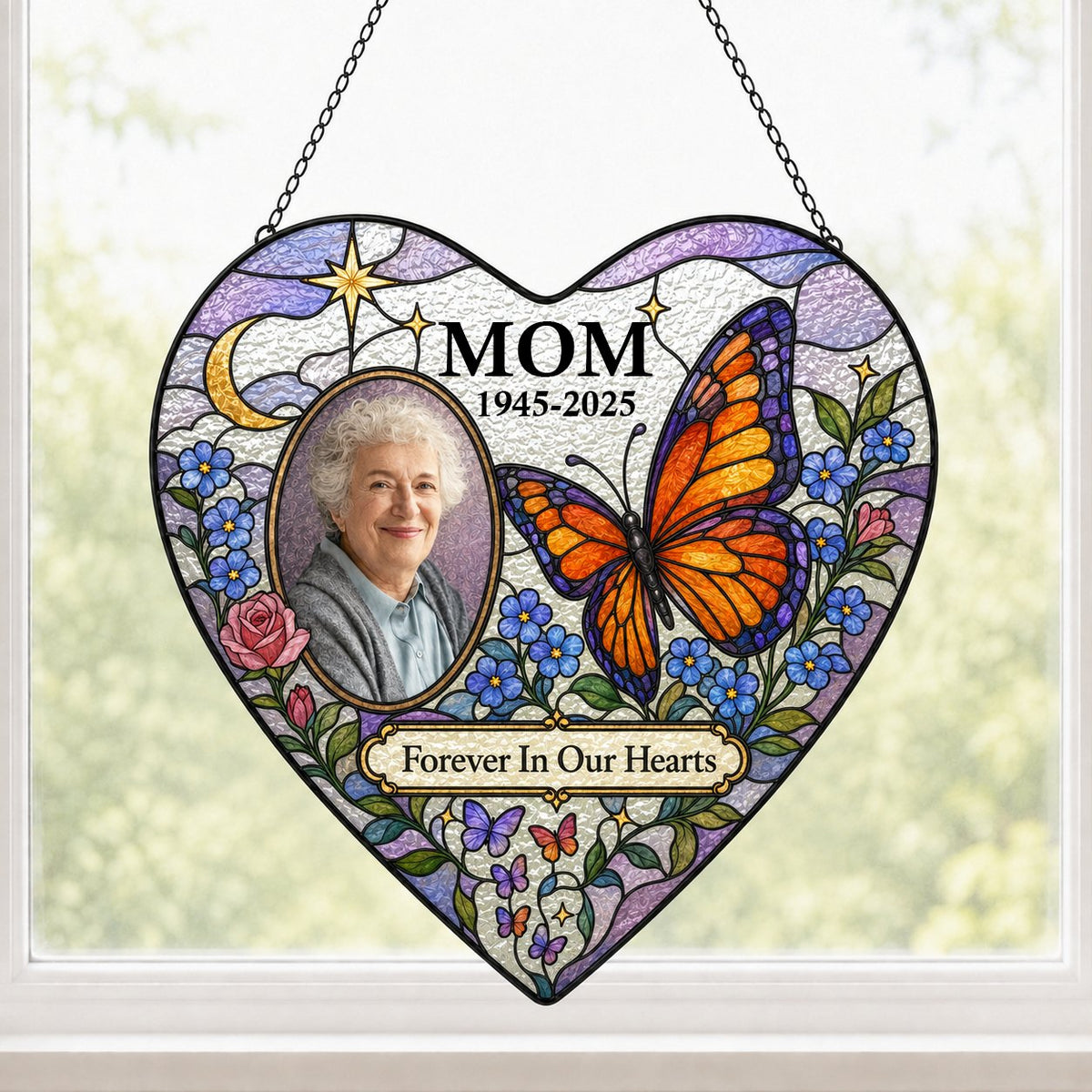 Heart suncatcher with photo oval, Forever In Our Hearts text, butterfly, moon, roses and forget-me-nots.