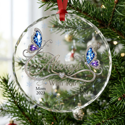 Round glass ornament with blue and purple jeweled butterflies, silver infinity heart, and light blue snowflakes.