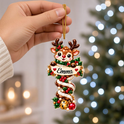Custom-cut acrylic ornament with Santa or penguin holding a name banner on a red-and-white candy cane.
