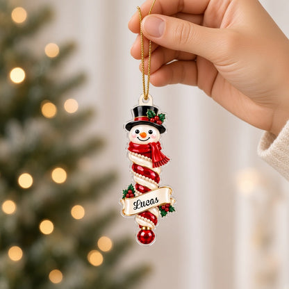 Custom-cut clear acrylic ornaments: a Christmas tree finial and a Mrs. Claus finial with cream name banners.