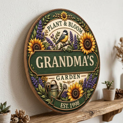 Round wooden sign with sunflowers, lavender, a chickadee, and green banners reading PLANT & BLOOM and GARDEN.