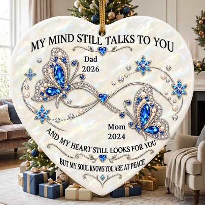 Heart ceramic ornament with blue jeweled butterflies, a silver infinity, and quote 'My Mind Still Talks To You'.