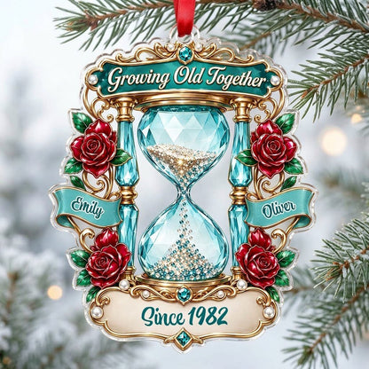 Custom-cut acrylic ornament with jeweled hourglass, red roses, and the words 'Growing Old Together'.