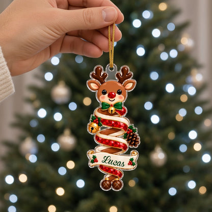 Clear acrylic ornaments shaped like a Christmas gnome and elf in red and green, each personalized with a name.