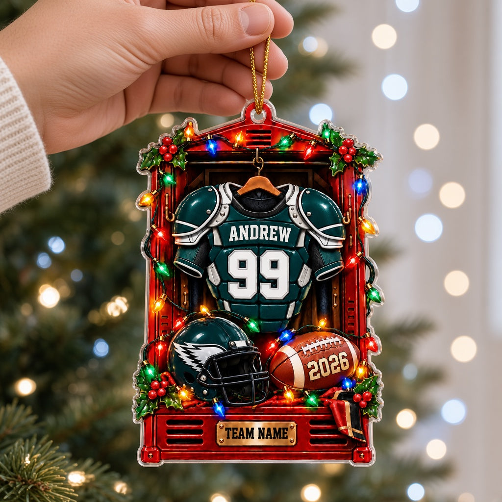 Acrylic ornament of a red football locker with a green jersey, helmet, football, lights and holly for Christmas