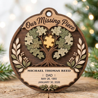 Round wood ornament displays “Our Missing Piece” with a puzzle-piece family tree and a gold missing piece at the center.