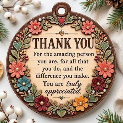 Round wood ornament with carved-look floral border and THANK YOU appreciation message in the center.