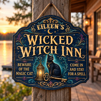 Custom-cut wooden sign with black cat, glowing lantern, golden key, crescent moons, stars, and Wicked Witch Inn text
