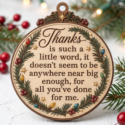 Wood ornament with arched top, pine branches, colorful lights, red berries, gold stars, and a heartfelt thank-you quote.