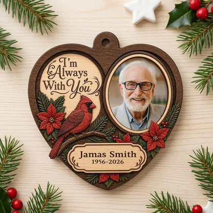 Heart-shaped wood ornament with red cardinal, poinsettias, a right-side photo frame, and 'I'm Always With You' text.