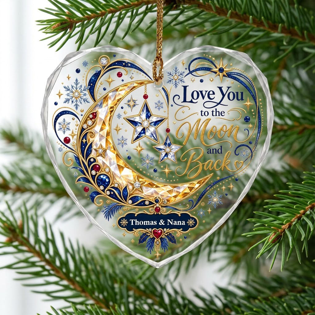 Heart glass ornament with jeweled gold crescent moon, blue hanging stars, and 'Love You to the Moon and Back' text.