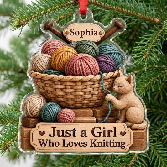 Acrylic ornament shaped around a yarn basket, cat and needles with 'Just a Girl Who Loves Knitting' and a name banner.