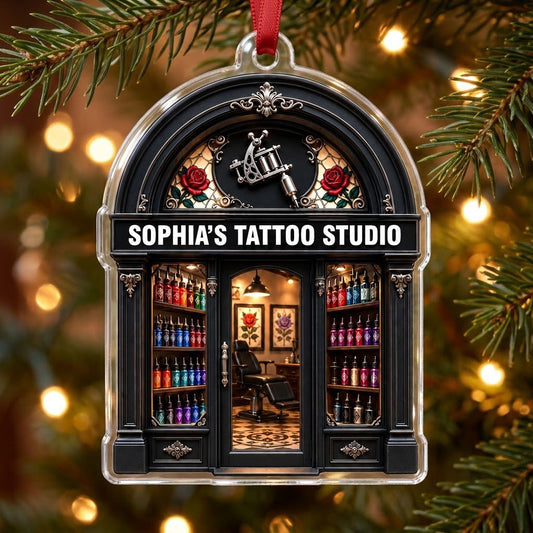 Arched black storefront tattoo ornament with silver machine, stained-glass roses, ink bottles, and a 'TATTOO STUDIO' sig
